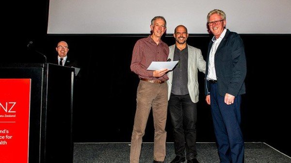 Dr John Burton, Kawhia Health Centre, receiving his award from board members Dr Frank Cullen and Dr Brendon Eade. 