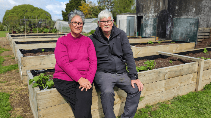 Moe and Derek Roberts with the raised vegetable gardens created from timber gifted to the marae by Waikato Tainui. 